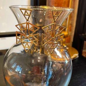 Gold tone geometric earrings.